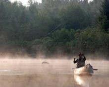 Angler in Canoe